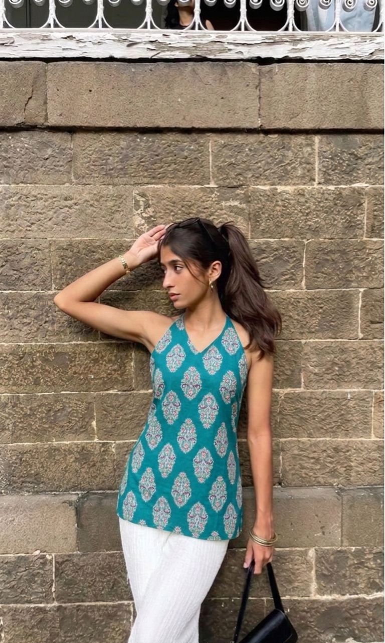 The Laila Kurti by Roop Tara – teal block print halter neck Taj cotton kurti front view with white palazzos