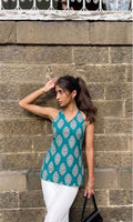 The Laila Kurti by Roop Tara – teal block print halter neck Taj cotton kurti front view with white palazzos