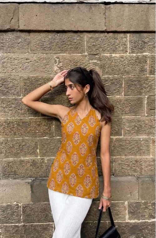 Maya Kurti mustard halter neck kurti in Taj cotton with ethnic block print