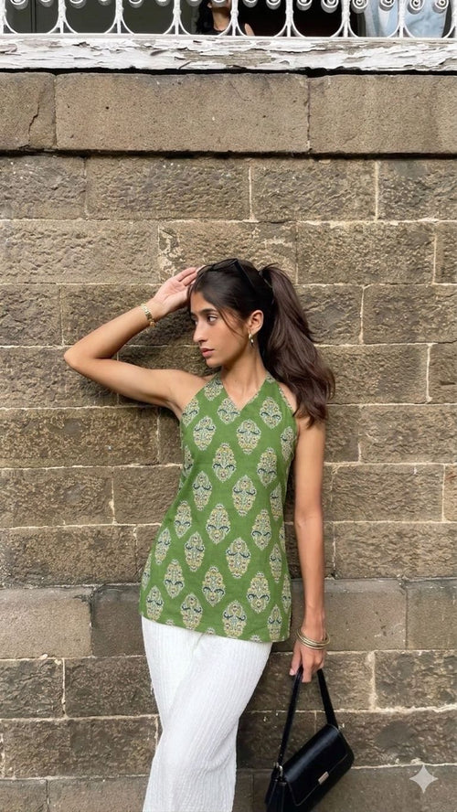 Green halter neck Kyra kurti for women with traditional print paired with white trousers – Roop Tara ethnic wear