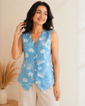 Front view of Heer Reversible Short Kurti in Sky Blue Floral print with V-neck and button details.