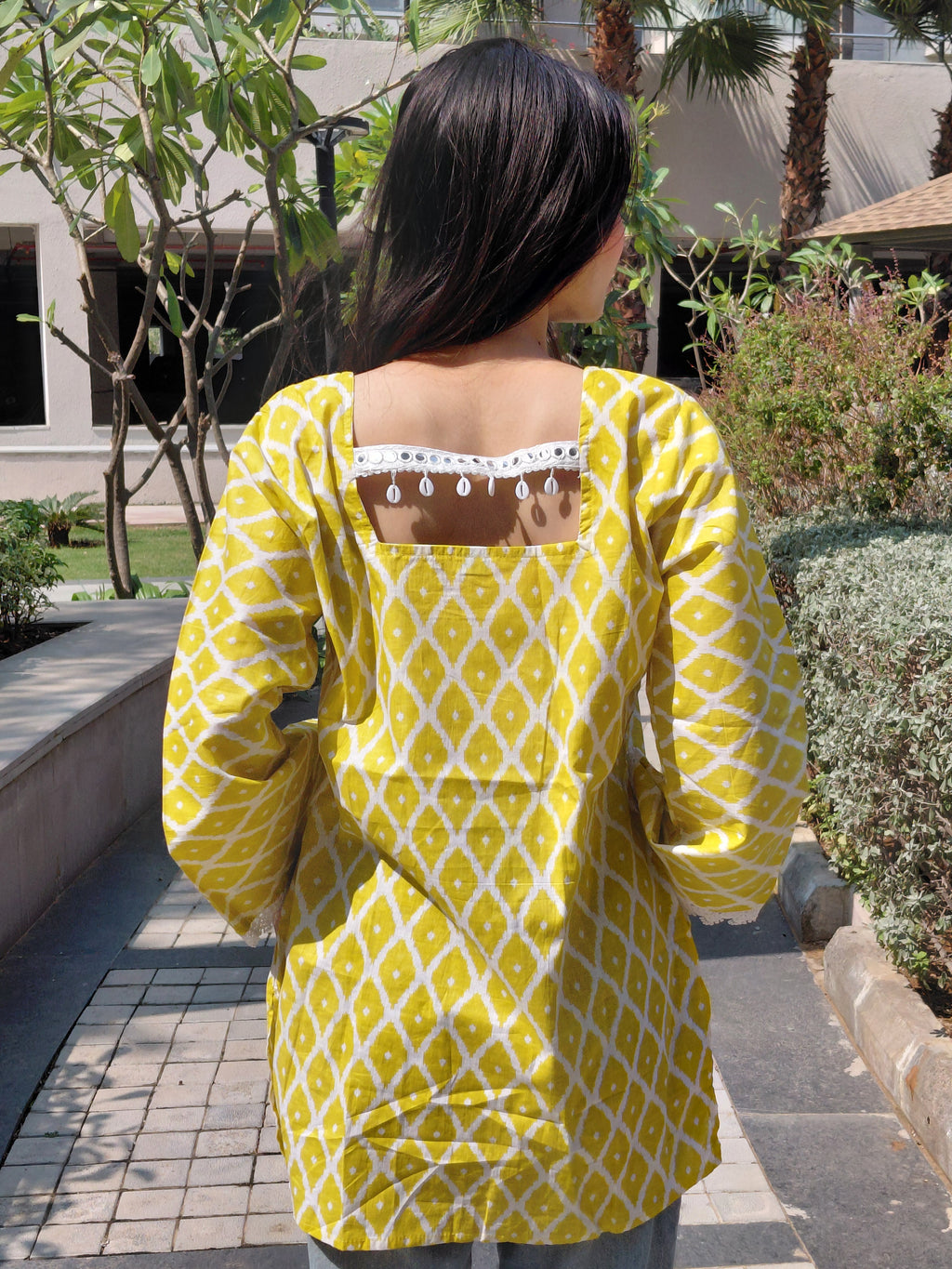 Amaya kurti yellow diamond print square back cutout cowrie shells tassels, breathable cotton fusion kurti Roop Tara